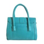 Bolso para dama HNA de color azul, material piel vegada, asa estática en la parte superior del color del bolso para ser tomado con la mano